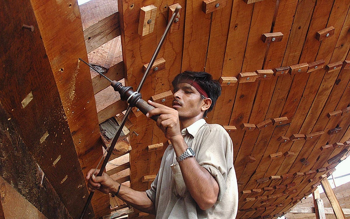 A giant wooden boat being built by hand in Karachi, Pakistan